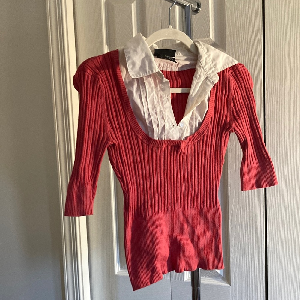 It’s our time quarter sleeve sweater with white v-neck collared shirt top.